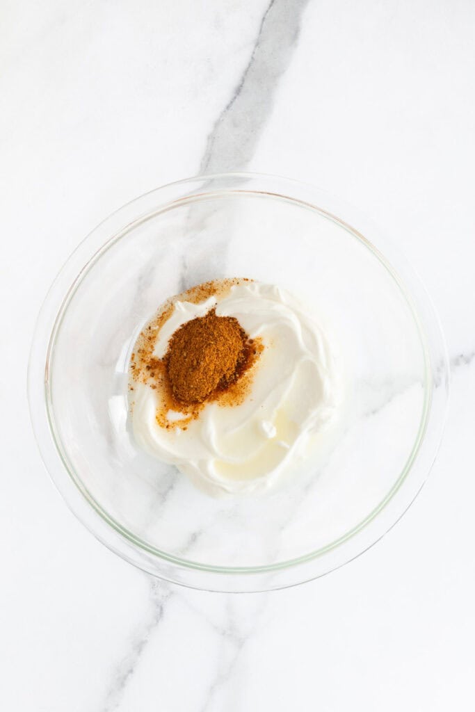 Sour cream and taco seasoning and lime juice mixed together