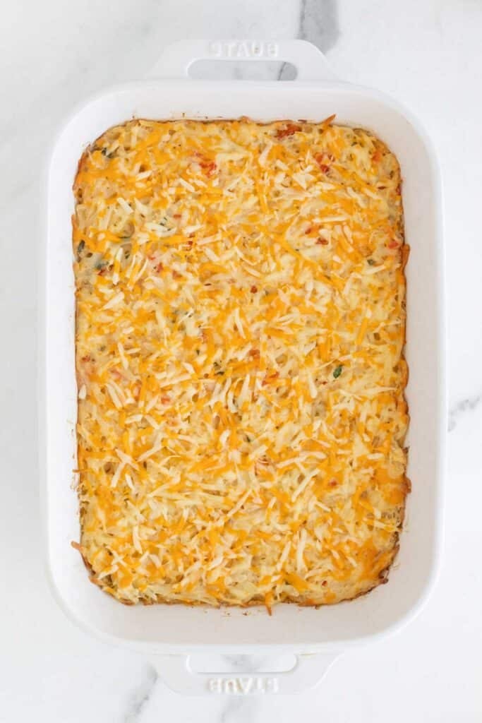 Baked hashbrown casserole in a white dish