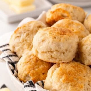 Basket of golden homemade southern buttermilk biscuits