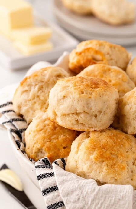 Basket of golden homemade southern buttermilk biscuits