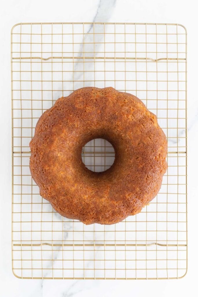 Carrot Bundt cake cooling on a wire rack, removed from the pan