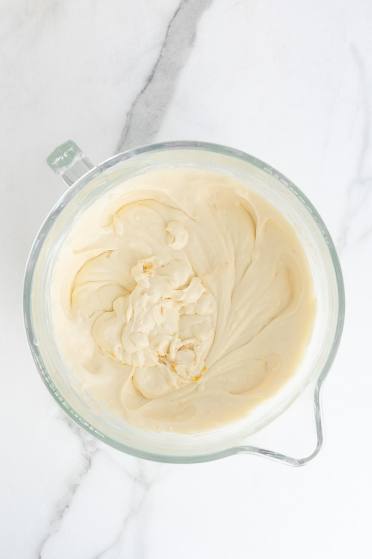 Final cheesecake batter fully mixed and ready to pour