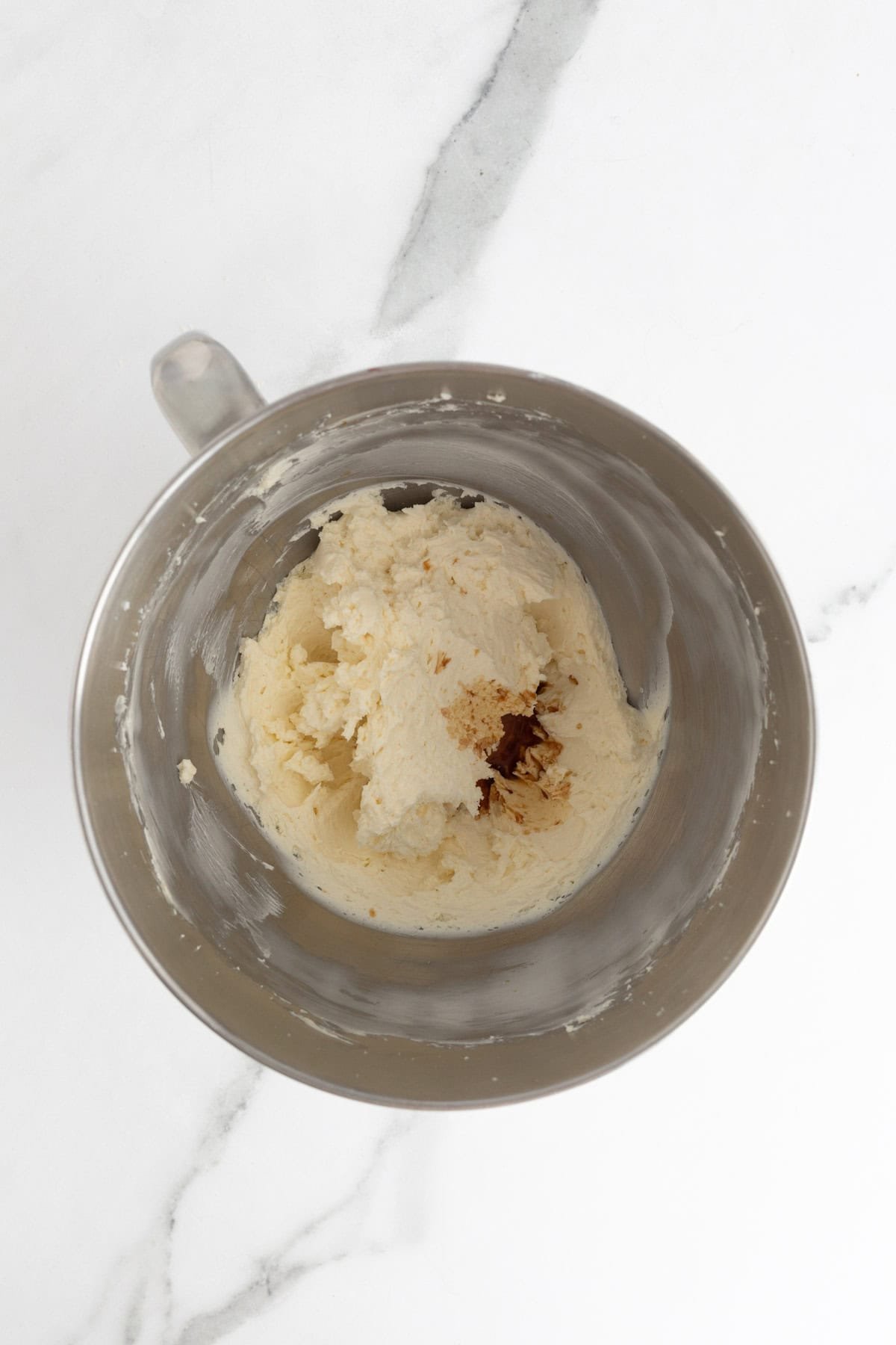 Whipped butter and cream cheese mixture with vanilla extract added