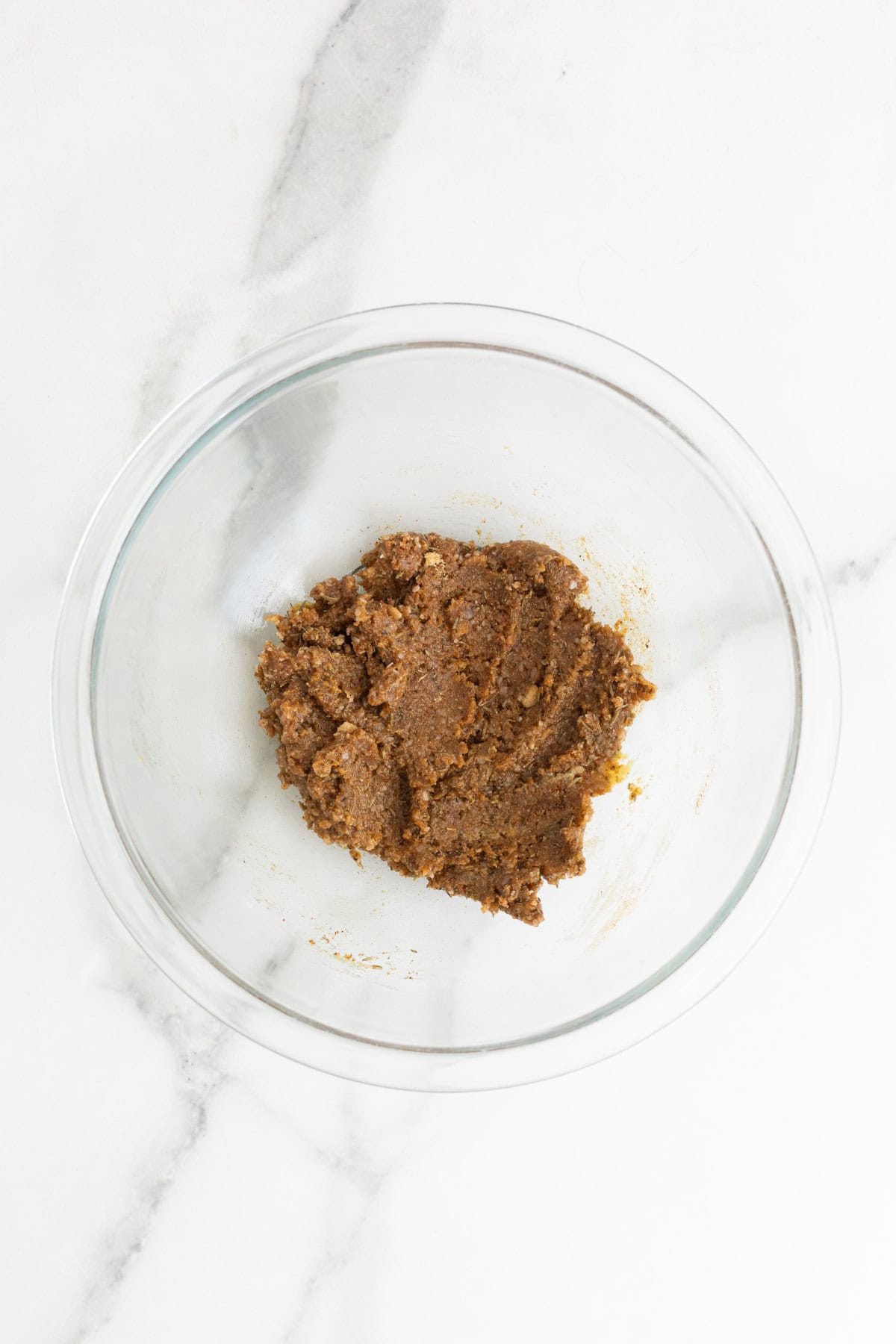 Mixed spice rub for pork chops in a glass bowl