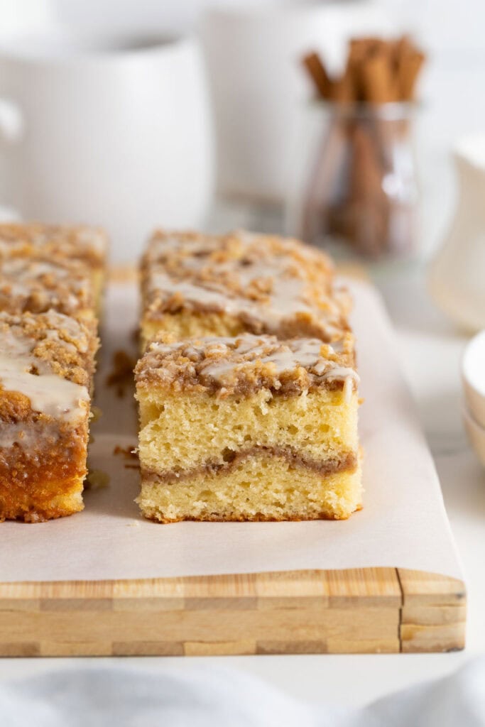 Close up of slices of coffee cake recipe on white parchment paper