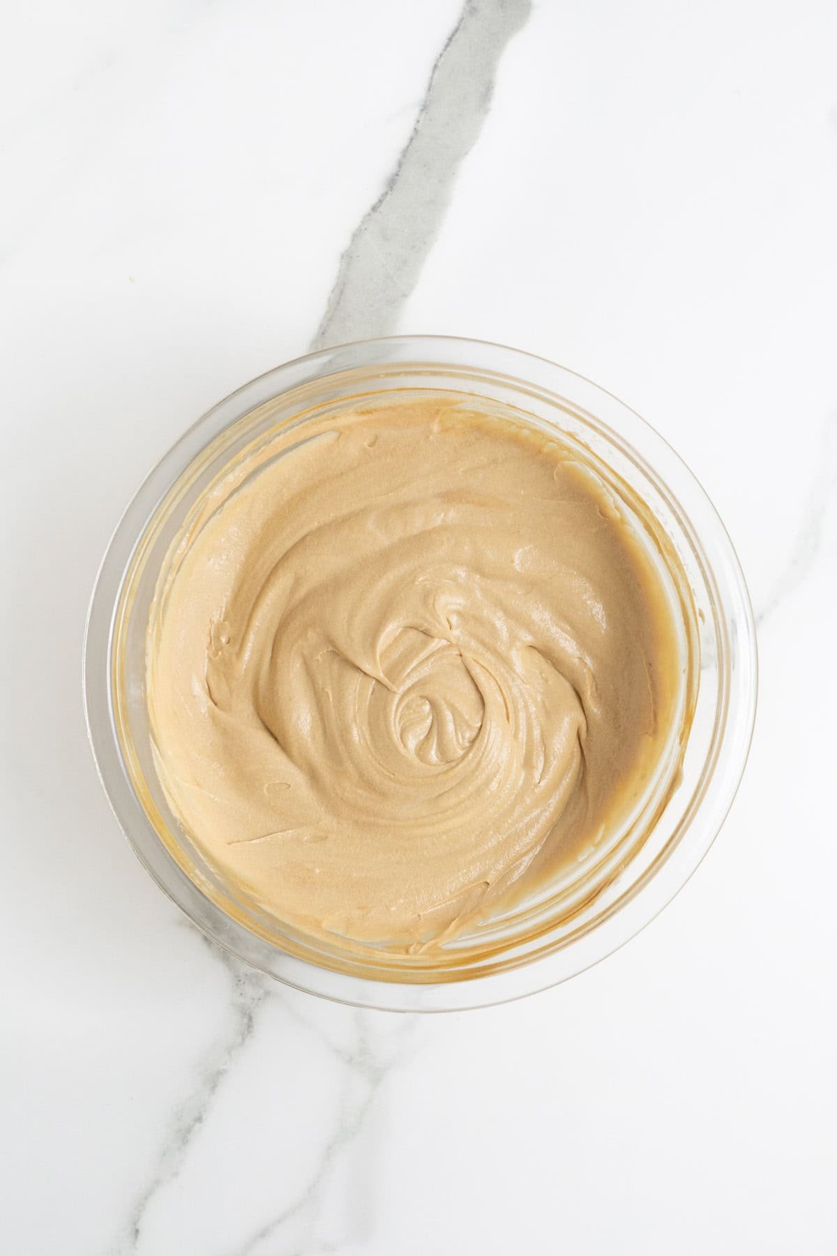 Fully combined creamy coffee mixture in a glass bowl