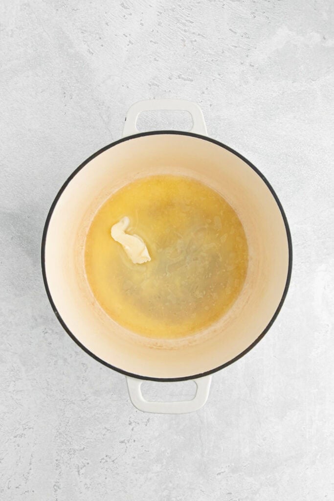 Olive oil and butter in a pot melting