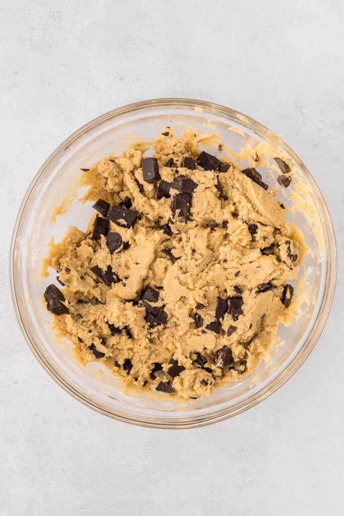 Mixed chocolate chunks in a cookie dough