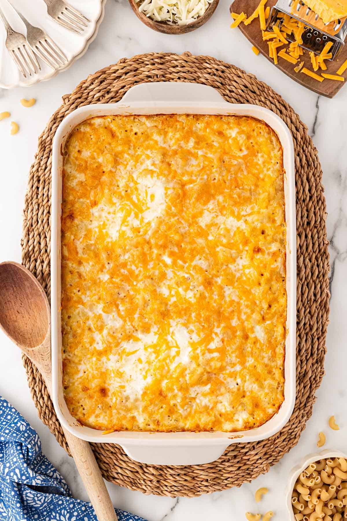 Baked mac and cheese with a golden melted cheese topping in a casserole dish