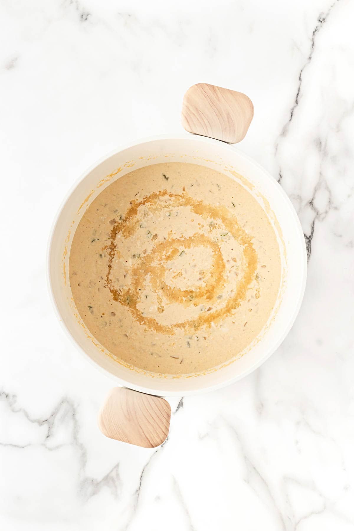 Finished she crab soup in the pot with sherry poured on top