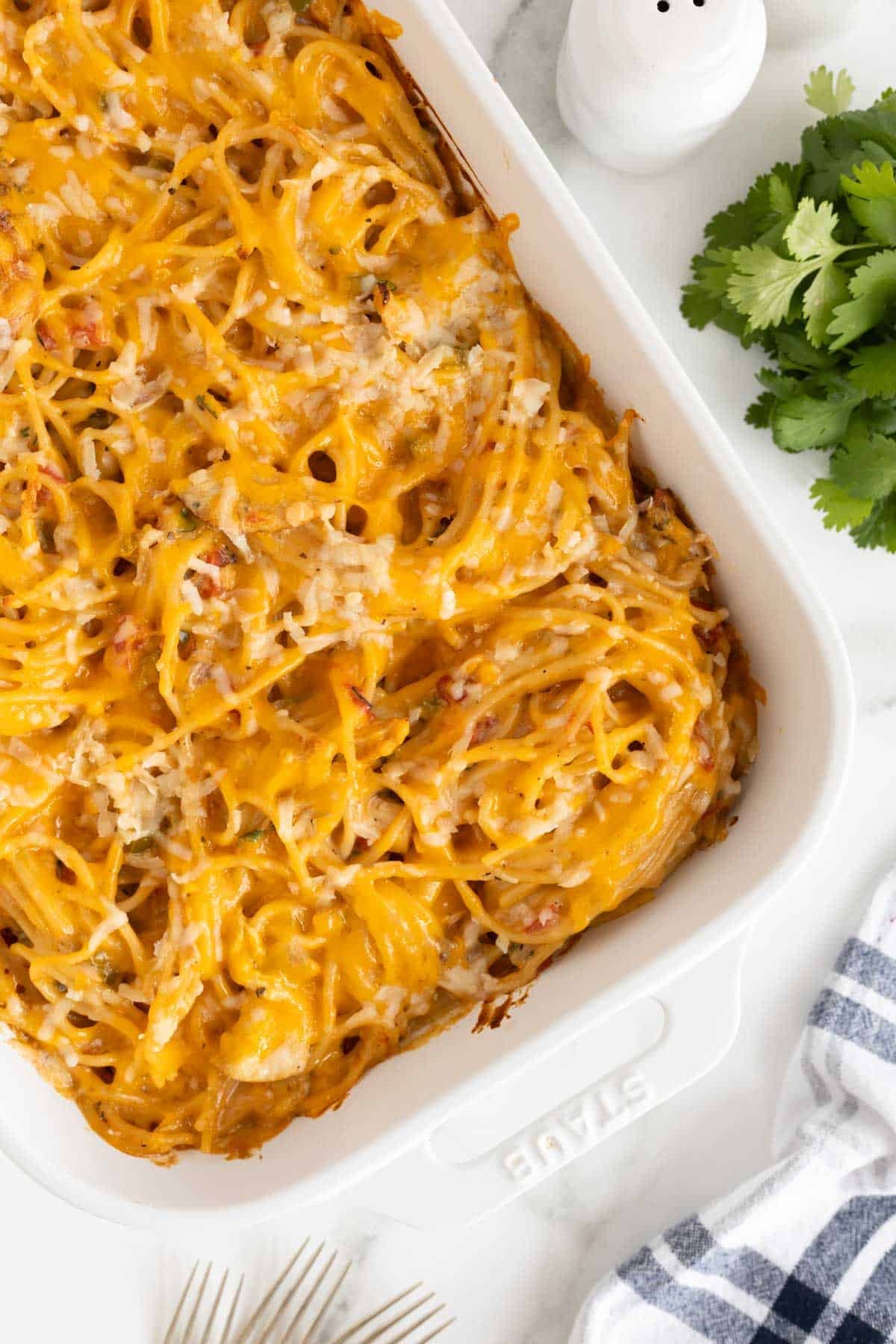 Overhead shot of cheesy baked chicken spaghetti casserole